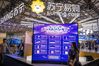 Attendees visit a stand of Suning.com Co during CES Asia in Shanghai on June 14, 2018. [Photo provided to China Daily]