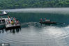 2020年8月7日，湖南省郴州市资兴市，来自全国各地的游人在观赏小东江江面的雾漫奇观，形似一幅壮美的水墨山水画，犹如最美梦幻的仙境。来源：IC photo 胡雁/IC photo