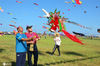 2020年9月26日，山东省潍坊市，风筝放飞队伍在第37届潍坊国际风筝会现场放飞风筝。
