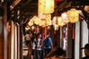  Tourists walk along an alleyway decorated with lanterns in the ancient town of Zhouzhuang in Kunshan, east China's Jiangsu Province, Sept. 27, 2020. (Xinhua/Yang Lei)