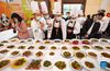 Chefs display traditional Sichuan dishes during a Sichuan cuisine skills competition in Chengdu, capital of southwest China's Sichuan Province, Oct. 18, 2021. The 2021 World Sichuan Cuisine Conference kicked off on Monday in Pidu District of Chengdu City, during which chefs show the trending culinary skills of Sichuan cuisines. (Xinhua/Jiang Hongjing)