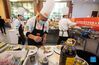 Chefs prepare dishes during a Sichuan cuisine skills competition in Chengdu, capital of southwest China's Sichuan Province, Oct. 18, 2021. The 2021 World Sichuan Cuisine Conference kicked off on Monday in Pidu District of Chengdu City, during which chefs show the trending culinary skills of Sichuan cuisines. (Xinhua/Jiang Hongjing)