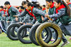 2021年10月19日，江苏镇江，南徐小学的同学们正在滚轮胎。
