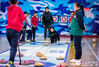 A student plays dryland curling in a school competition. (People’s Daily Online/Ding Genhou)