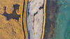 2021年10月24日，无人机航拍新疆博湖县博斯腾湖湿地，芦苇金黄，湖水碧绿，绝胜秋景，宛如画卷。
