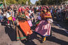 MADRID, SPAIN - OCTOBER 24: Women wearing traditional clothes dance during the Transhumance Festival on October 24, 2021 in Madrid, Spain. The Transhumance Festival is a traditional event with thousands of sheep filling the main roads of the Spanish capital. Since 1994, the event has claimed to highlight the role of transhumance, the seasonal moving of livestock between pastures, and extensive livestock farming as tools for conserving biodiversity and fighting climate change. (Photo by Aldara Zarraoa/Getty Images)