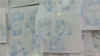 （具体拍摄时间不详）广州，团队成员绘制的吉祥物“冰墩墩”的草图。（视频截图）