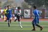 Teenagers compete in the finals of a campus football competition for primary school students in Wujiang district, Suzhou on March 14. [Photo/IC]