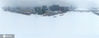2021年3月21日，黑龙江省哈尔滨市，一场春雪，用纷纷扬扬的雪花做笔，把冰城描绘成一幅幅着色简单的水墨画。松花江、江畔路、树木、景阳广场、滨洲桥、哈齐高铁特大桥、街路、行人、塑像、车辆、车痕……都成为这幅水墨画的主角。