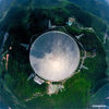 Aerial photo taken on March 28, 2021 shows China's Five-hundred-meter Aperture Spherical radio Telescope (FAST) under maintenance in southwest China's Guizhou Province. FAST has identified over 300 pulsars so far. Located in a naturally deep and round karst depression in southwest China's Guizhou Province, it officially began operating on Jan. 11, 2020. (Xinhua/Ou Dongqu)