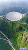 Aerial photo taken on March 28, 2021 shows China's Five-hundred-meter Aperture Spherical radio Telescope (FAST) under maintenance in southwest China's Guizhou Province. FAST has identified over 300 pulsars so far. Located in a naturally deep and round karst depression in southwest China's Guizhou Province, it officially began operating on Jan. 11, 2020. (Xinhua/Ou Dongqu)