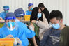 2021年3月1日，北京，清华大学临时接种点，学生有序接种新冠疫苗。