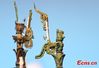 This photo taken on April 8, 2021 shows the bronze sculpture of a tree excavated in 1986 from the Sanxingdui Ruins site in Guanghan, southwest China's Sichuan Province. （Photo: China News Service/An Yuan）