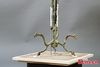 This photo taken on April 8, 2021 shows the bronze sculpture of a tree excavated in 1986 from the Sanxingdui Ruins site in Guanghan, southwest China's Sichuan Province. （Photo: China News Service/An Yuan）