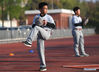 Students take part in a baseball training session in Xinji Center Primary School in Yizheng, east China's Jiangsu Province, April 9, 2021. Born in a 