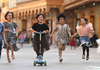 Children have fun on Dove Lane in Hotan city, Northwest China's Xinjiang Uygur autonomous region, May 27, 2020. [Photo/Xinhua]