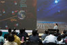 Researcher Huang Jing introduces the discovery during a news conference in Beijing, capital of China, April 2, 2021. The Tibet ASgamma experiment, a China-Japan joint research project, has detected that a supernova remnant may be the source of some ultrahigh-energy cosmic rays. Cosmic rays are high-energy particles that move through space at nearly the speed of light. It is believed that particles could be accelerated in PeVatron and reach a petaelectron volt (PeV), which creates 100 times more energy than the record high achieved by any human-made accelerator on Earth. Scientists have been trying to find these cosmic accelerators, hoping they could provide clues about how stars evolve and how energy is transported throughout the galaxy. No PeVatrons have been firmly detected yet. On Tuesday, a team of scientists from China and Japan reported in Nature Astronomy that they had identified supernova remnant SNR G106.3+2.7 as a potential PeVatron in our galaxy from the China-Japan Tibet ASgamma experiment. (Xinhua/Jin Liwang)