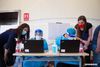 Two foreign recipients (1st L & 1st R) get registered for Sinovac COVID-19 vaccines at a vaccination site in Tsinghua University, Beijing, April 3, 2021. Beijing has recently started COVID-19 vaccination for foreign nationals in the city. Foreign nationals aged 18 and above may, following the principle of voluntary participation, giving informed consent and assuming personal responsibility for risk, take the COVID-19 vaccine. [Xinhua/Chen Zhonghao]