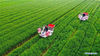 Aerial photo taken on April 5, 2021 shows farmers working in the field with agricultural machinery in Huicheling village of Changxing county, Huzhou city, East China's Zhejiang province. [Photo/Xinhua]