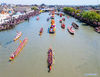 Aerial photo taken on April 4, 2021 shows a boat race during the Maoshan Boat Fair, a national intangible cultural heritage event in Xinghua City of east China's Jiangsu Province. (Photo by Gu Jihong/Xinhua)