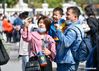 Tourists pose for selfie at the Italian Style Area in Hebei District of north China's Tianjin, May 1, 2021. The area ushered in the first public reception day after an overall upgrade. Many tourists took advantage of the May Day holiday to visit the area and enjoy leisure time. (Xinhua/Sun Fanyue)