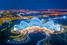 Designed by French architect Paul Andreu, the Nantong Grand Theater looks like five shining flower petals floating on the Zilang Lake in Nantong, East China's Jiangsu province. [Photo/ntfabu.com]