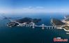 The undated photo shows the Pingtan Strait Road-rail Bridge in southeast China’s Fujian. (China News Service/Wang Dongming)
As the world's longest cross-sea road-rail bridge, the 16.34 km project connects Pingtan Island in Fujian with four nearby islets.
The upper level of the bridge, opening for trial operation on Oct 1, 2020, is a two-way six-lane freeway with a designed speed of 100 km/h, while the lower level, opening on December 26, 2020, is a two-line railway with a designed speed of 200 km/h.