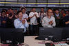 Researchers celebrate the success of experiment at the control center of the experimental advanced superconducting tokamak (EAST) on the early morning of May 28, 2021. Chinese scientists have set a new world record of achieving a plasma temperature of 120 million degrees Celsius for a period of 101 seconds in the latest experiment on Friday, a key step toward the test running of a fusion reactor. The experiment at the experimental advanced superconducting tokamak (EAST), or the 