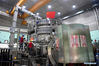Staff members perform an upgrade to the experimental advanced superconducting tokamak (EAST) at the Hefei Institutes of Physical Science under the Chinese Academy of Sciences (CAS) on April 13, 2021. Chinese scientists have set a new world record of achieving a plasma temperature of 120 million degrees Celsius for a period of 101 seconds in the latest experiment on Friday, a key step toward the test running of a fusion reactor. The experiment at the experimental advanced superconducting tokamak (EAST), or the 