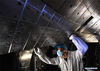 A staff member performs an upgrade to the experimental advanced superconducting tokamak (EAST) at the Hefei Institutes of Physical Science under the Chinese Academy of Sciences (CAS) on April 28, 2021. Chinese scientists have set a new world record of achieving a plasma temperature of 120 million degrees Celsius for a period of 101 seconds in the latest experiment on Friday, a key step toward the test running of a fusion reactor. The experiment at the experimental advanced superconducting tokamak (EAST), or the 
