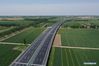 Aerial photo taken on May 10, 2021 shows a view of the first phase of Beijing-Dezhou expressway in north China's Hebei Province. The Hebei section of Beijing-Xiong'an expressway, the new route of Rongcheng-Wuhai expressway and the first phase of Beijing-Dezhou expressway opened to traffic on Saturday. (Xinhua/Zhu Xudong)