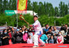 A martial artist performs in Suning County of Cangzhou City, north China's Hebei Province, May 2, 2021. Official data showed 230 million domestic tourist trips were made during the five-day Labor Day holiday, up 119.7 percent from last year. (Xinhua/Zhu Xudong)