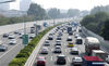 Vehicles proceed slowly on the expressway around Guangzhou, capital city of south China's Guangdong Province, May 1, 2021. Official data showed 230 million domestic tourist trips were made during the five-day Labor Day holiday, up 119.7 percent from last year. (Xinhua/Lu Hanxin)
