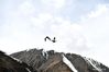 Birds fly around the Sapukonglagabo Mountain in Biru County of Nagqu, southwest China's Tibet Autonomous Region, May 4, 2021. (Xinhua/Sun Ruibo)