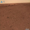 Photo released on June 11, 2021 by the China National Space Administration (CNSA) shows the Martian landscape. The China National Space Administration Friday released new images taken by the country's first Mars rover Zhurong, showing national flag on the red planet. The images were unveiled at a ceremony in Beijing, signifying a complete success of China's first mars exploration mission. The images include the landing site panorama, Martian landscape and a selfie of the rover with the landing platform. (CNSA/Handout via Xinhua)