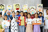 As Father's Day approaches, children at Donggao Kindergarten in Nantong City, Jiangsu Province draw portraits for father with paintbrush and clay on Jun. 18. (CFP Photo) 