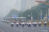 The motorcade carrying recipients of the July 1 Medal is accompanied by motorcycle escorts on the way to the Great Hall of the People in Beijing, capital of China, June 29, 2021. A ceremony is about to be held Tuesday morning to award the July 1 Medal, the highest honor in the Communist Party of China (CPC), to outstanding Party members for the first time. The ceremony will be held at the Great Hall of the People in Beijing. (Xinhua/Xing Guangli)