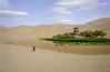 Tourists visit the Yueya Spring scenic area in Dunhuang, Gansu province, May 30, 2021. [Photo/Xinhua]