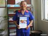 Zhang Heshan shows the published photo of the Great Wall in Chengziyu Village, Qinhuangdao, north China's Hebei Province, July 7, 2021. Zhang Heshan, 66, is a villager of Chengziyu, where lies a section of China's Great Wall dating back to Ming Dynasty (1368-1644). Since 1978, Zhang has been a protector of the Great Wall. Over the years, he patrolled the wild Great Wall near his village and never been held back by various challenges, such as blizzards, rainstorms, wild bees and snakes. He has persuaded the herdsmen to leave, scared away the brick-stealers, stopped tourists from making carvings on the Wall, and reported damages. 