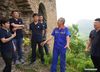 Zhang Heshan (2nd R) introduces the Great Wall culture to tourists on the Chengziyu Great Wall in Qinhuangdao, north China's Hebei Province, July 7, 2021. Zhang Heshan, 66, is a villager of Chengziyu, where lies a section of China's Great Wall dating back to Ming Dynasty (1368-1644). Since 1978, Zhang has been a protector of the Great Wall. Over the years, he patrolled the wild Great Wall near his village and never been held back by various challenges, such as blizzards, rainstorms, wild bees and snakes. He has persuaded the herdsmen to leave, scared away the brick-stealers, stopped tourists from making carvings on the Wall, and reported damages. 