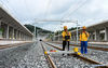 Construction workers work at Puer Station on the China-Laos railway in Puer City, southwest China's Yunnan Province, July 2, 2021. The China-Laos railway, which stretches more than 1,000 km from Kunming, capital of China's Yunnan Province, to Vientiane of Laos is scheduled to open in December this year. Upon completion, it will slash the travel time between the two cities to less than one day, according to China State Railway Group Co., Ltd. (Xinhua/Wang Guansen)