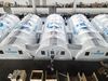 Air-inflated testing labs for COVID-19 nucleic acid testing are being set up at the Yangzhou International Exhibition Center in Yanghzou, East China's Jiangsu province, on Aug 10, 2021. [Photo by Meng Delong/for China Daily]