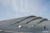 Workers work at the construction site for the expansion project of Kashgar International Airport in Kashgar, northwest China's Xinjiang Uygur Autonomous Region, Aug. 7, 2021. The expansion project of Kashgar International Airport is expected to be completed by the end of the year. (Xinhua/Gao Han)