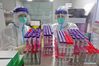 Medical workers arrange samples for COVID-19 test at Yuhuangding Hospital in Yantai, east China's Shandong Province, Aug. 7, 2021. Yantai had completed the first round of nucleic acid testing citywide with zero positive result, according to a press conference held on Saturday. The second round of nucleic acid testing has started. (Photo by Tang Ke/Xinhua)