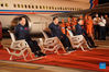 Astronauts Nie Haisheng (C), Liu Boming (R) and Tang Hongbo salute after arriving in Beijing, capital of China, Sept. 17, 2021. Three Chinese astronauts, the first sent to orbit for space station construction, have completed their three-month mission and returned to Earth safely on Friday. They arrived in Beijing by plane Friday night. (Photo by Guo Zhongzheng/Xinhua)