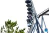Tourists experience a roller coaster at the Universal Beijing Resort in Beijing, capital of China, Sept. 20, 2021. The Universal Beijing Resort, currently the largest in scale worldwide, opened to the public on Monday. The resort, covering 4 square km, includes the highly anticipated Universal Studios Beijing theme park, the Universal CityWalk, and two hotels. (Xinhua/Ren Chao)

