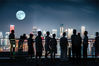 People admire the full moon in Chongqing municipality on Sept 21, 2021. [Photo/IC]