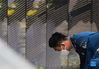 A soldier lays flowers in front of the memorial wall of Chinese People's Volunteers (CPV) martyrs at the CPV martyrs' cemetery in Shenyang, northeast China's Liaoning Province, Sept. 3, 2021. The remains of 109 Chinese soldiers killed in the 1950-53 Korean War were laid to rest on Friday in Shenyang. (Xinhua/Yang Qing)