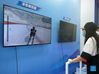 A visitor tries a ski simulator during the 2021 China International Fair for Trade in Services (CIFTIS) in Beijing, capital of China, Sept. 3, 2021. (Xinhua/Zhang Chenlin)