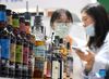 Staff members promote Irish alcohol drinks at the booth of Ireland during the 2021 China International Fair for Trade in Services (CIFTIS) in Beijing, capital of China, Sept. 3, 2021. (Xinhua/Wu Wei)